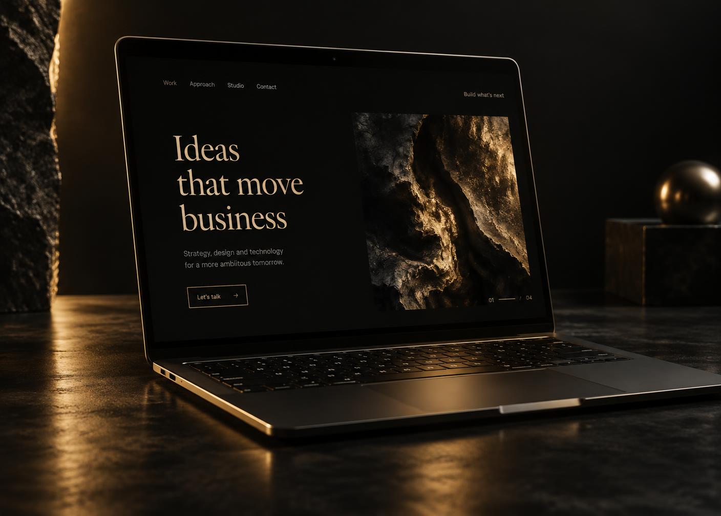 Laptop displaying a modern dark website designed by MNW Creative Studio